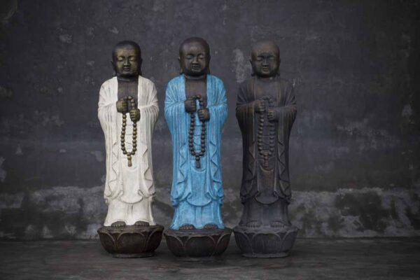Buddha holding prayer chain