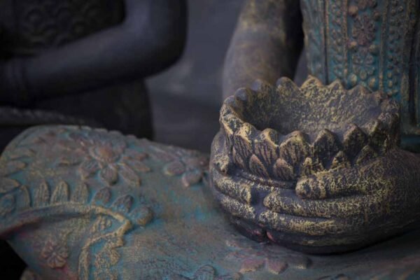 Meditating Buddha with bowl
