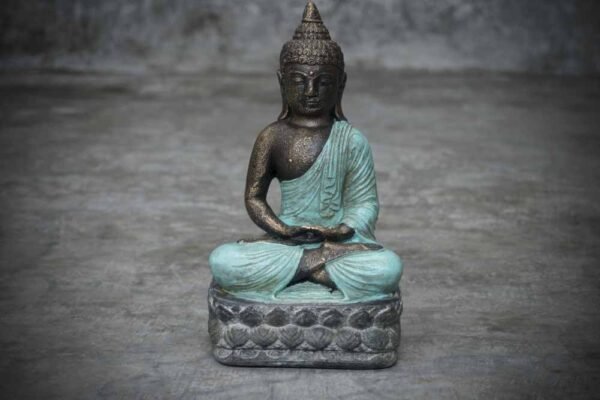 Sitting Buddha folded hands