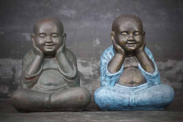 sitting Buddha head on hands