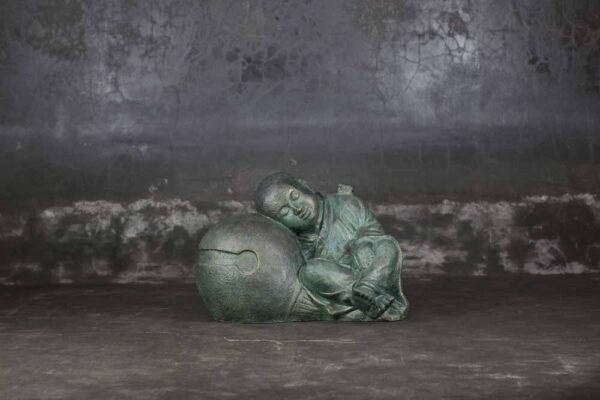 Sleeping Buddha on sphere