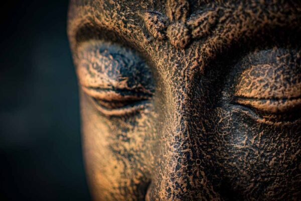 Stonework products colorful meditating Buddha details eyes