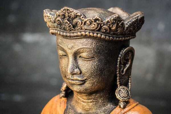 Crowned Buddha praying details head