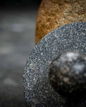 River stone covered cup dark detail