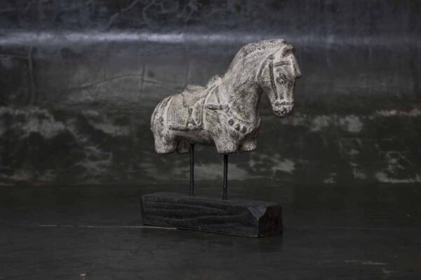 Horse on wooden stand
